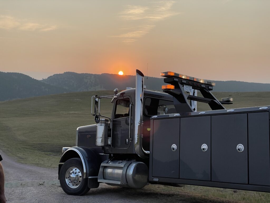 heavy duty towing wrecker with sunset